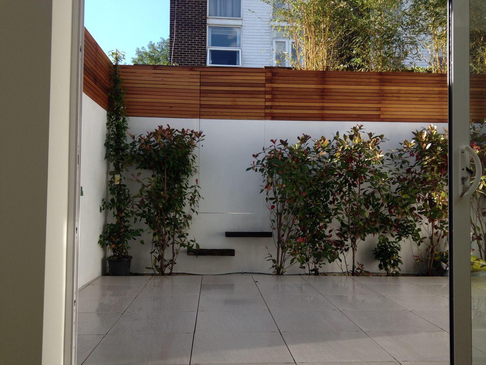 Courtyard with cedar slatted screen